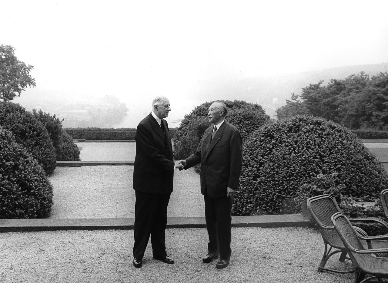 Charles de Gaulle shaking hands with German Chancellor Konrad Adenauer in Bonn in 1963. (Simon Müller / German Federal Archive)